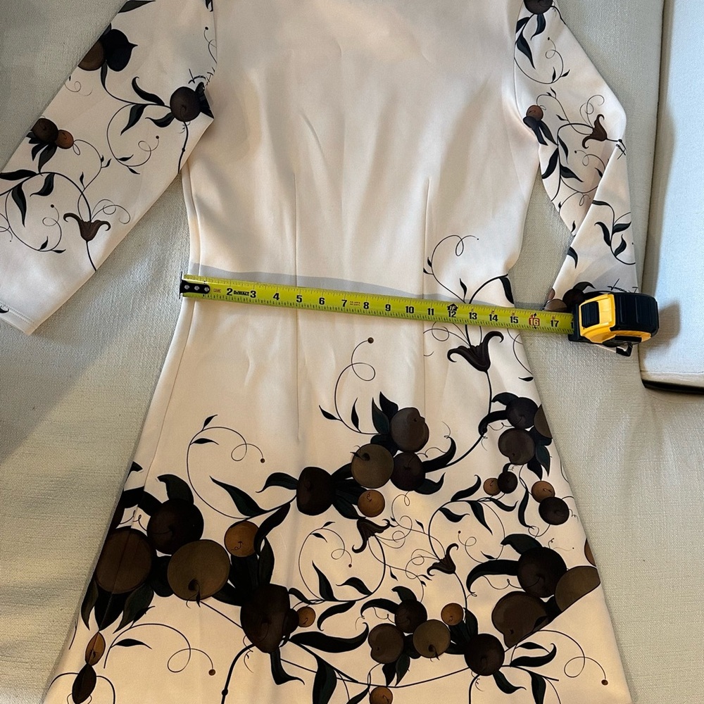 Dress in Cream and fall details with 3/4 sleeves